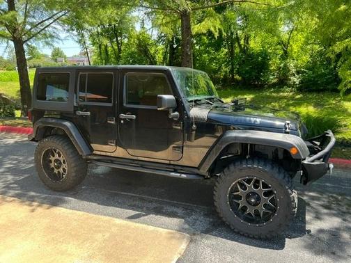 Black 2016 Jeep Wrangler Unlimited Willys Wheeler