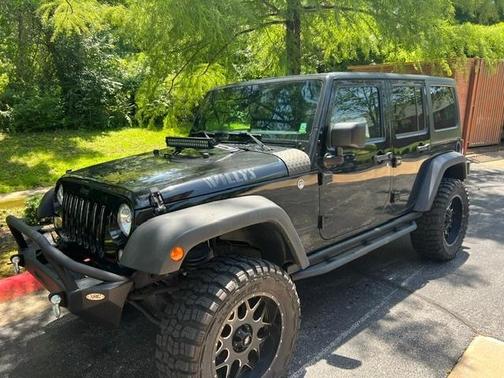 Black 2016 Jeep Wrangler Unlimited Willys Wheeler
