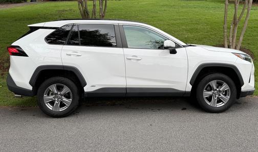 White 2023 Toyota RAV4 Hybrid LE