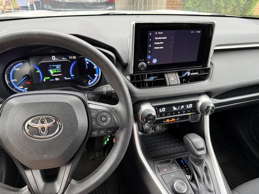White 2023 Toyota RAV4 Hybrid LE