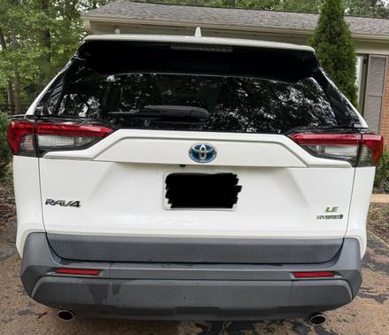 White 2023 Toyota RAV4 Hybrid LE