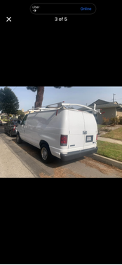 White 2006 Ford E150 Chateau