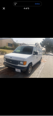 White 2006 Ford E150 Chateau