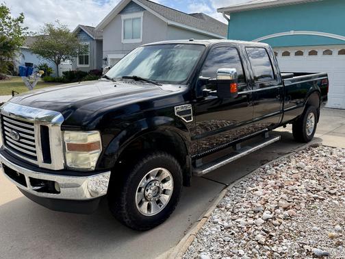 Black 2010 Ford F-350 Lariat Super Duty Crew Cab