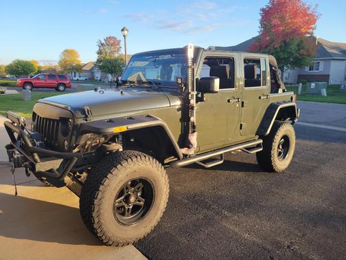 Green 2015 Jeep Wrangler Unlimited Sport