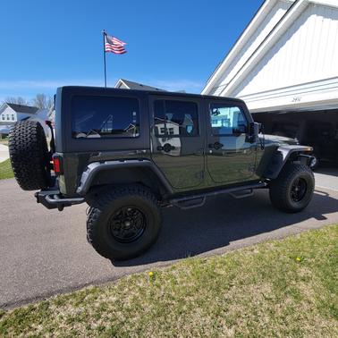 Green 2015 Jeep Wrangler Unlimited Sport