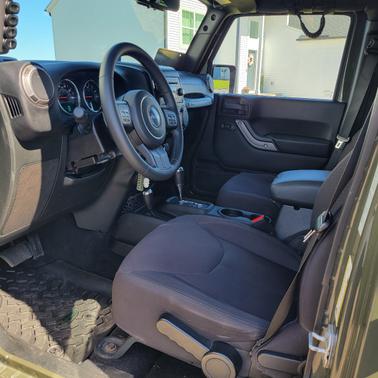 Green 2015 Jeep Wrangler Unlimited Sport