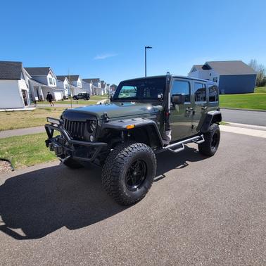 Green 2015 Jeep Wrangler Unlimited Sport