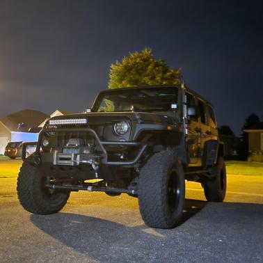 Green 2015 Jeep Wrangler Unlimited Sport
