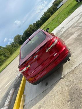 Red 2019 Ford Fusion SE