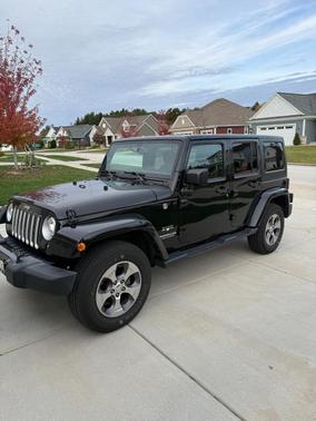 Black 2017 Jeep Wrangler Unlimited Sahara
