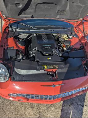 Orange 2003 Ford Thunderbird Deluxe