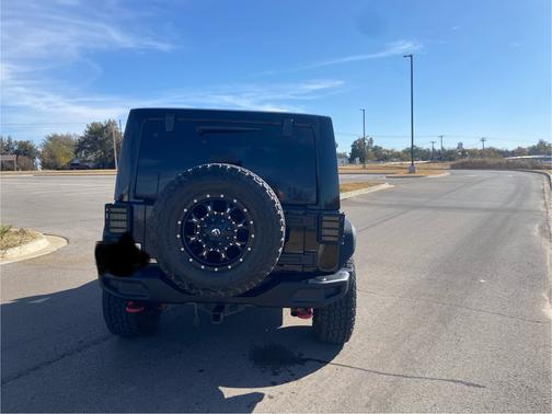 Black 2014 Jeep Wrangler Unlimited Rubicon