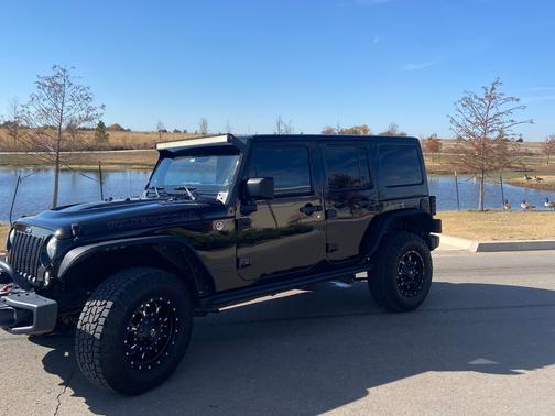 Black 2014 Jeep Wrangler Unlimited Rubicon