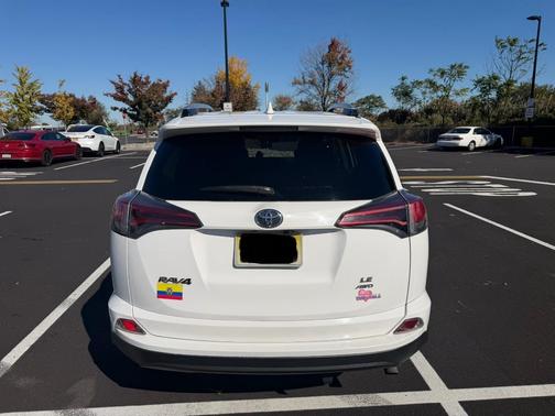 White 2016 Toyota RAV4 LE