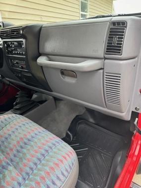 Red 1997 Jeep Wrangler Sport