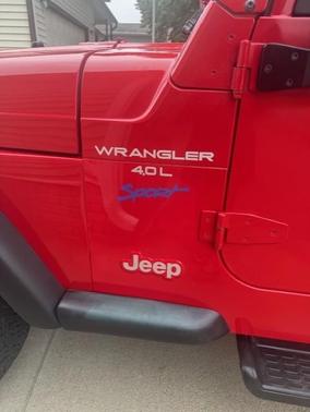 Red 1997 Jeep Wrangler Sport