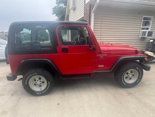 Red 1997 Jeep Wrangler Sport