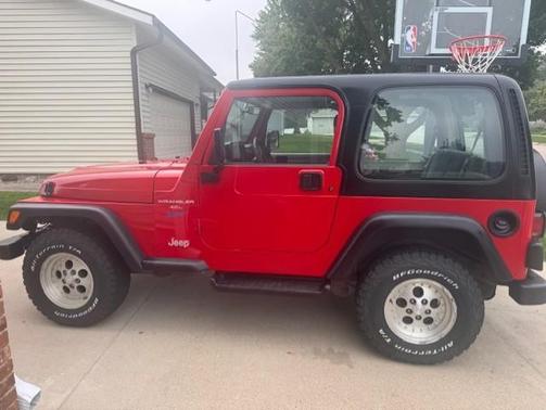 Red 1997 Jeep Wrangler Sport