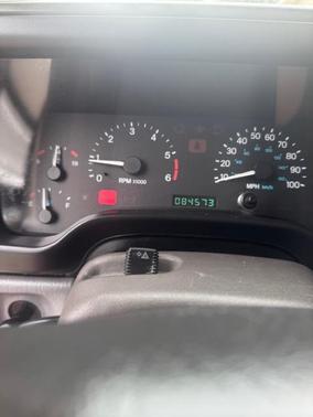 Red 1997 Jeep Wrangler Sport