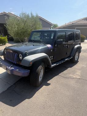 Black 2009 Jeep Wrangler Unlimited X