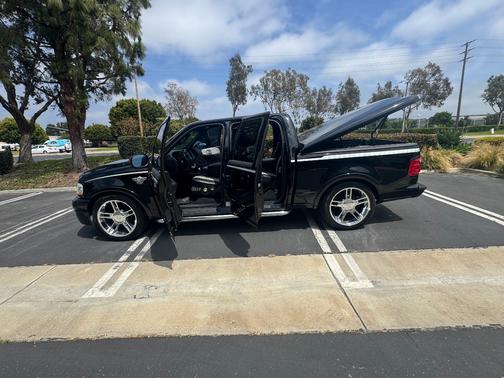 Black 2003 Ford F-150 Lariat SuperCrew