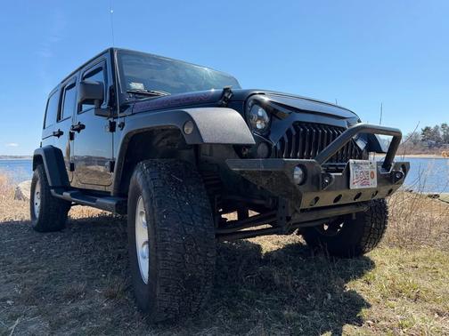 Black 2012 Jeep Wrangler Unlimited Rubicon