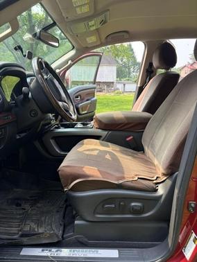 Red 2016 Nissan Titan XD Platinum Reserve