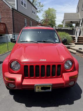 Red 2003 Jeep Liberty Limited