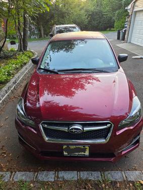 Red 2016 Subaru Impreza 2.0i