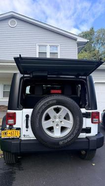 White 2014 Jeep Wrangler Sport