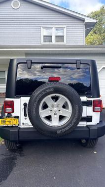 White 2014 Jeep Wrangler Sport