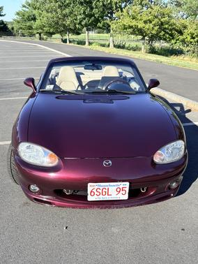 Red 2000 Mazda MX-5 Miata SE