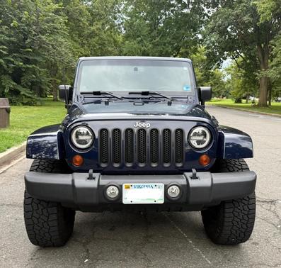 Blue 2013 Jeep Wrangler Unlimited Sahara