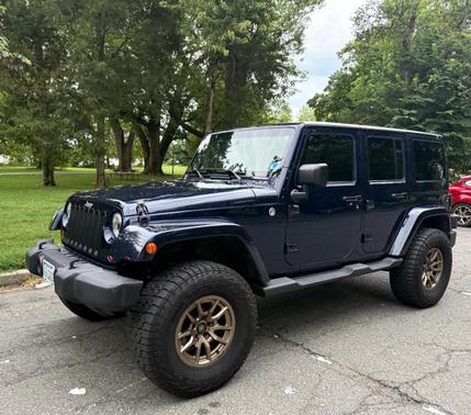Blue 2013 Jeep Wrangler Unlimited Sahara