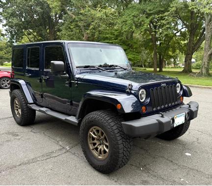 Blue 2013 Jeep Wrangler Unlimited Sahara