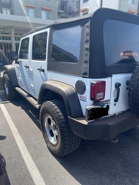 White 2016 Jeep Wrangler Unlimited Sport