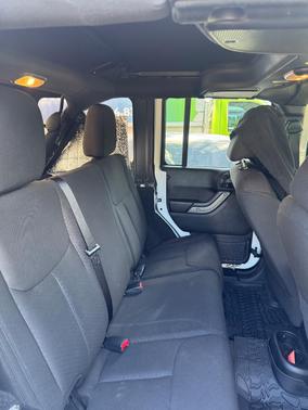 White 2016 Jeep Wrangler Unlimited Sport