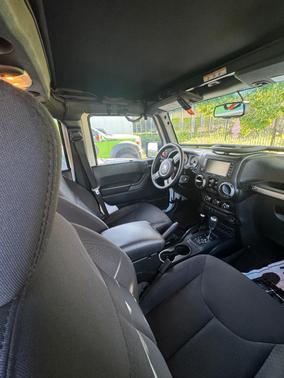 White 2016 Jeep Wrangler Unlimited Sport
