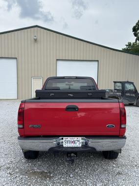 Red 2003 Ford F-150 XLT SuperCab