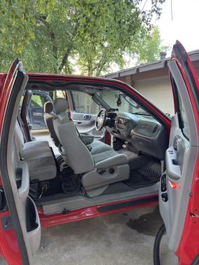 Red 2003 Ford F-150 XLT SuperCab