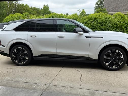 White 2025 Cadillac Escalade IQ Sport 1