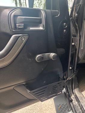 Black 2016 Jeep Wrangler Unlimited Sport