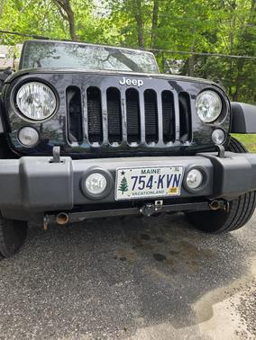 Black 2016 Jeep Wrangler Unlimited Sport