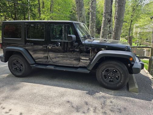 Black 2016 Jeep Wrangler Unlimited Sport
