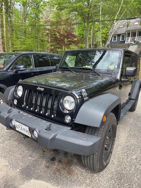 Black 2016 Jeep Wrangler Unlimited Sport