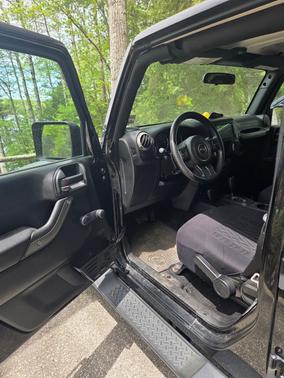 Black 2016 Jeep Wrangler Unlimited Sport