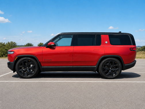 Red 2025 Rivian R1S Adventure Dual-Motor Max Pack