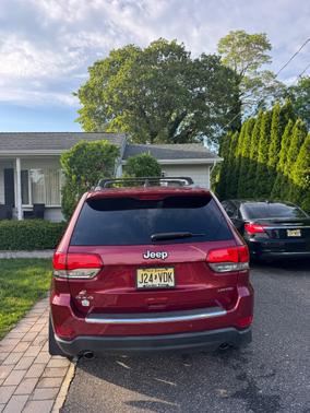 Red 2014 Jeep Grand Cherokee Limited