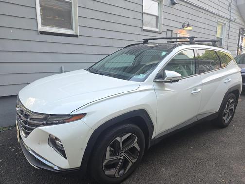 White 2023 Hyundai TUCSON Hybrid Limited
